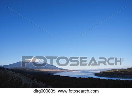 Morning light illuminating Mount Fuji and Lake Yamanaka, Yamanashi Prefecture, Japan View Large Photo Image Stock Photography - Morning light illuminating Mount Fuji and Lake Yamanaka, Yamanashi Prefecture, Japan. Fotosearch