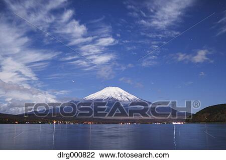 Night view of cloudy sky and Mount Fuji at night from Lake Yamanaka, Yamanashi Prefecture, Japan View Large Photo Image Stock Image - Night view of cloudy sky and Mount Fuji at night from Lake Yamanaka, Yamanashi Prefecture, Japan. Fotosearch