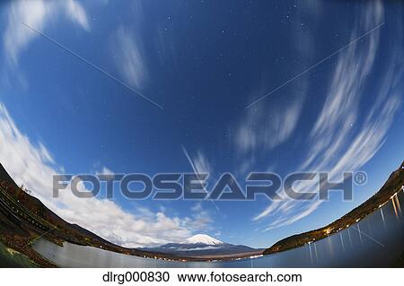 Night view of cloudy sky and Mount Fuji at night from Lake Yamanaka, Yamanashi Prefecture, Japan View Large Photo Image Stock Image - Night view of cloudy sky and Mount Fuji at night from Lake Yamanaka, Yamanashi Prefecture, Japan. Fotosearch