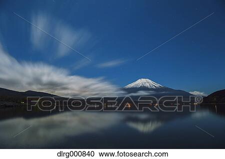Night view of cloudy sky and Mount Fuji at night from Lake Yamanaka, Yamanashi Prefecture, Japan View Large Photo Image Stock Image - Night view of cloudy sky and Mount Fuji at night from Lake Yamanaka, Yamanashi Prefecture, Japan. Fotosearch