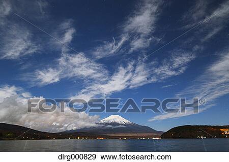 Night view of cloudy sky and Mount Fuji at night from Lake Yamanaka, Yamanashi Prefecture, Japan View Large Photo Image Stock Photo - Night view of cloudy sky and Mount Fuji at night from Lake Yamanaka, Yamanashi Prefecture, Japan. Fotosearch