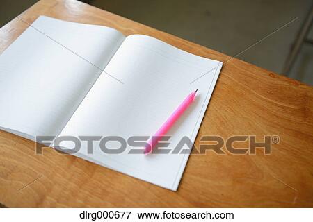 Notebook on school desk View Large Photo Image Stock Photo - Notebook on school desk. Fotosearch