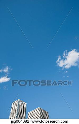 Office buildings and blue sky View Large Photo Image Stock Image - Office buildings and blue sky. Fotosearch