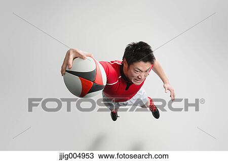 Portrait of Japanese rugby player diving to score a try View Large Photo Image Stock Image - Portrait of Japanese rugby player diving to score a try. Fotosearch