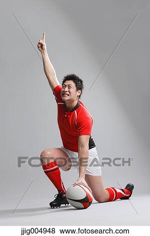 Portrait of Japanese rugby player cheering up View Large Photo Image Stock Photo - Portrait of Japanese rugby player cheering up. Fotosearch