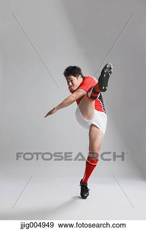 Portrait of Japanese rugby player kicking View Large Photo Image Stock Photo - Portrait of Japanese rugby player kicking. Fotosearch