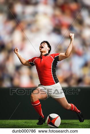 Portrait of Japanese rugby player cheering up View Large Photo Image Stock Photograph - Portrait of Japanese rugby player cheering up. Fotosearch