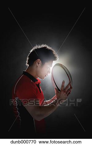 Portrait of Japanese rugby player with ball View Large Photo Image Stock Image - Portrait of Japanese rugby player with ball. Fotosearch