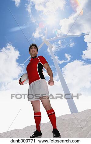 Portrait of Japanese rugby player with ball View Large Photo Image Stock Image - Portrait of Japanese rugby player with ball. Fotosearch