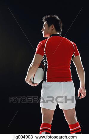 Portrait of Japanese rugby player with ball View Large Photo Image Stock Image - Portrait of Japanese rugby player with ball. Fotosearch