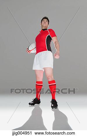 Portrait of Japanese rugby player with ball View Large Photo Image Stock Image - Portrait of Japanese rugby player with ball. Fotosearch