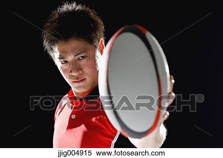 Portrait of Japanese rugby player with ball View Large Photo Image Stock Photography - Portrait of Japanese rugby player with ball. Fotosearch