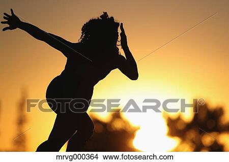 Running female athlete silhouette View Large Photo Image Picture - Running female athlete silhouette. Fotosearch