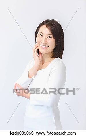Stock Image - Senior Japanese woman portrait. Fotosearch