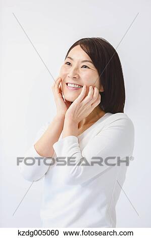 Stock Image - Senior Japanese woman portrait. Fotosearch