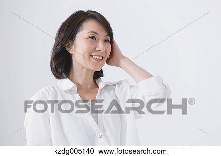Stock Image - Senior Japanese woman portrait. Fotosearch