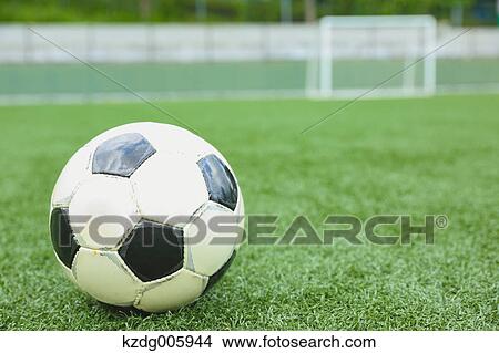 Soccer ball on grass View Large Photo Image Picture - Soccer ball on grass. Fotosearch