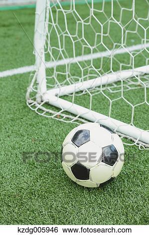 Soccer ball on grass View Large Photo Image Stock Photograph - Soccer ball on grass. Fotosearch