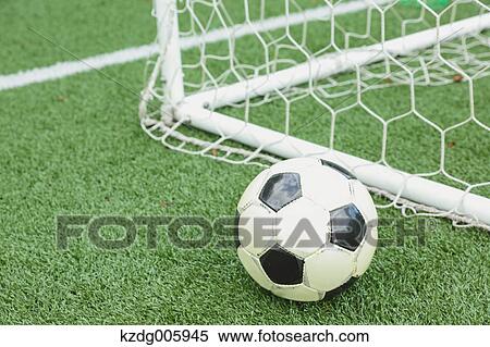 Soccer ball on grass View Large Photo Image Stock Photography - Soccer ball on grass. Fotosearch
