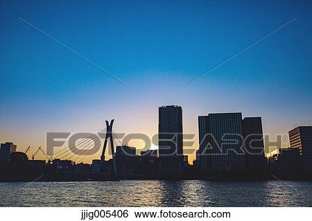 Sunset view of bridge over a river in Tokyo, Japan View Large Photo Image Stock Photograph - Sunset view of bridge over a river in Tokyo, Japan. Fotosearch