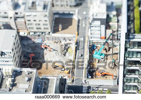 Tilt-shift bird's eye view of building construction work, Tokyo, Japan View Large Photo Image Stock Photo - Tilt-shift bird's eye view of building construction work, Tokyo, Japan. Fotosearch