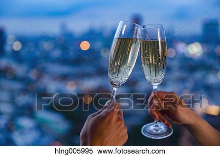 Toasting with champagne in front of Tokyo cityscape View Large Photo Image Stock Photography - Toasting with champagne in front of Tokyo cityscape. Fotosearch
