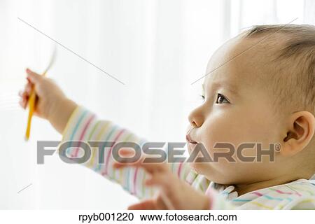 Toddler in the house View Large Photo Image Stock Image - Toddler in the house. Fotosearch