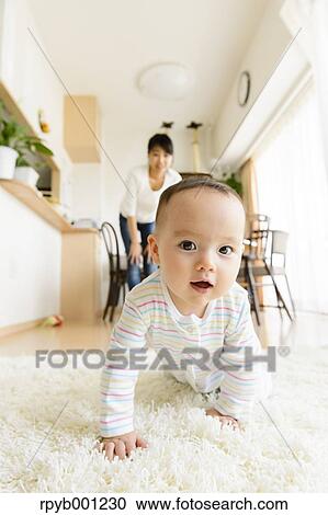 Toddler in the house View Large Photo Image Stock Image - Toddler in the house. Fotosearch