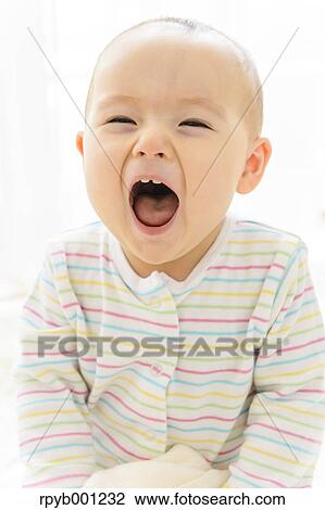 Toddler in the house View Large Photo Image Stock Image - Toddler in the house. Fotosearch