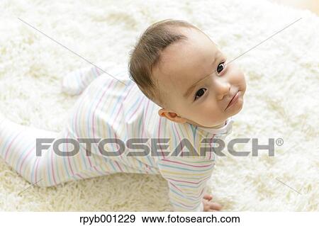 Toddler in the house View Large Photo Image Stock Photo - Toddler in the house. Fotosearch