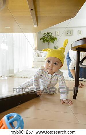 Toddler in the house View Large Photo Image Stock Photo - Toddler in the house. Fotosearch
