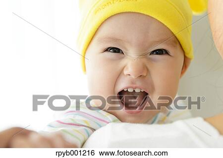 Toddler in the house View Large Photo Image Stock Photograph - Toddler in the house. Fotosearch