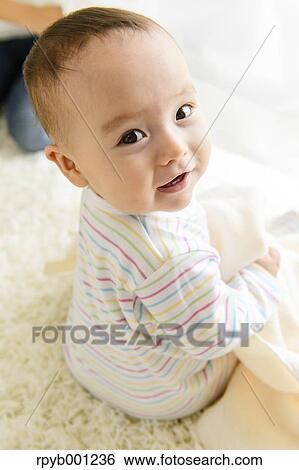 Toddler in the house View Large Photo Image Stock Photograph - Toddler in the house. Fotosearch