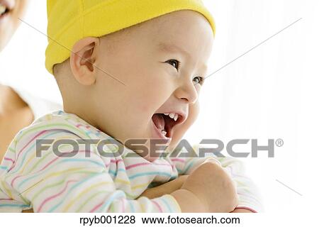 Toddler with mum in the house View Large Photo Image Stock Photo - Toddler with mum in the house. Fotosearch