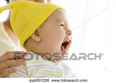 Toddler with mum in the house View Large Photo Image Stock Photograph - Toddler with mum in the house. Fotosearch
