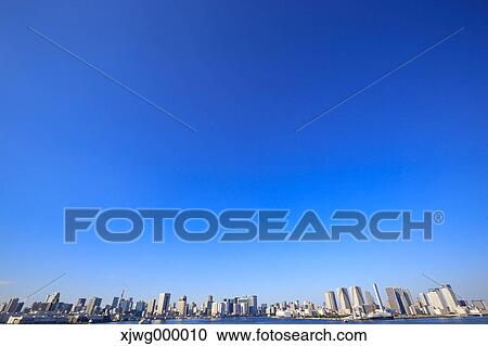 Stock Image - Tokyo cityscape and blue sky, Tokyo, Japan. Fotosearch