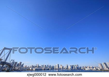Stock Image - Tokyo cityscape and blue sky, Tokyo, Japan. Fotosearch