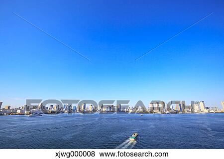 Stock Photo - Tokyo cityscape and blue sky, Tokyo, Japan. Fotosearch