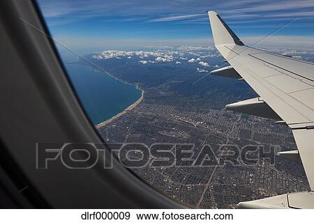 View from airplane window View Large Photo Image Stock Photo - View from airplane window. Fotosearch