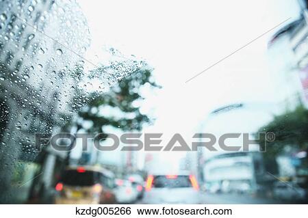 View from car window during a typhoon in Tokyo, Japan View Large Photo Image Stock Photograph - View from car window during a typhoon in Tokyo, Japan. Fotosearch