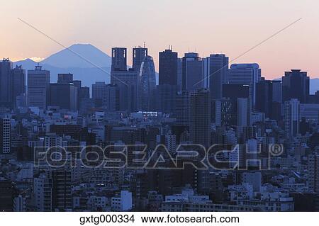 View of Mount Fuji and cityscape, Tokyo, Japan View Large Photo Image Picture - View of Mount Fuji and cityscape, Tokyo, Japan. Fotosearch