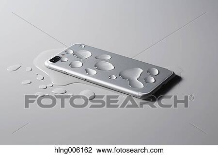Waterproof smartphone covered with water View Large Photo Image Stock Image - Waterproof smartphone covered with water. Fotosearch