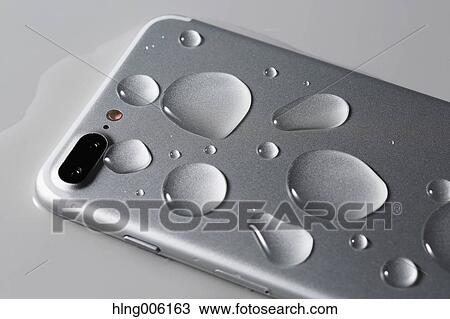 Waterproof smartphone covered with water View Large Photo Image Stock Image - Waterproof smartphone covered with water. Fotosearch