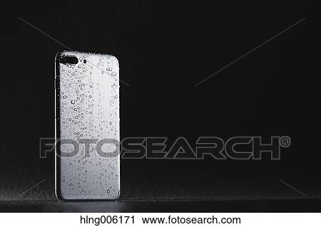 Waterproof smartphone covered with water View Large Photo Image Stock Image - Waterproof smartphone covered with water. Fotosearch