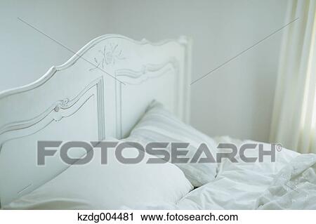 Stock Image - White bed. Fotosearch