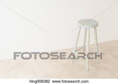 Wooden chair in a white room View Large Photo Image Stock Image - Wooden chair in a white room. Fotosearch