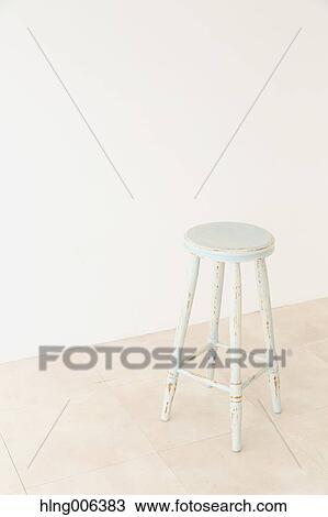 Wooden chair in a white room View Large Photo Image Stock Image - Wooden chair in a white room. Fotosearch