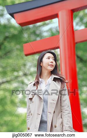 Young attractive Japanese woman at the temple View Large Photo Image Stock Photo - Young attractive Japanese woman at the temple. Fotosearch