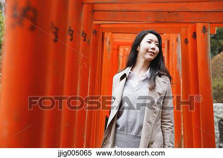 Young attractive Japanese woman at the temple View Large Photo Image Stock Photography - Young attractive Japanese woman at the temple. Fotosearch