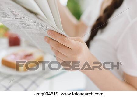 Young attractive Japanese woman having breakfast at home View Large Photo Image Stock Photo - Young attractive Japanese woman having breakfast at home. Fotosearch